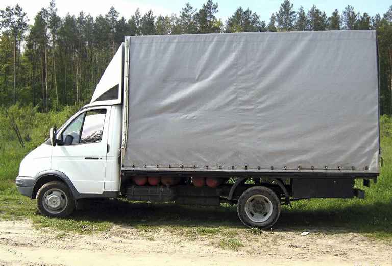 Заказ газели тент для перевозки заказать отдельную машину 20-ти тонника из Волжского в Тихвина